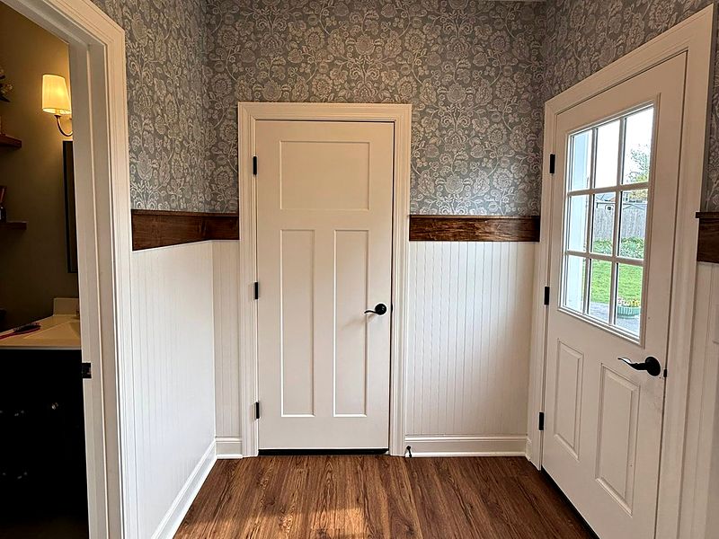 Beadboard wainscoting with a wood chair rail and door casings